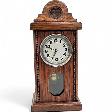 Miniature mantel clock in oak wood, 1920s