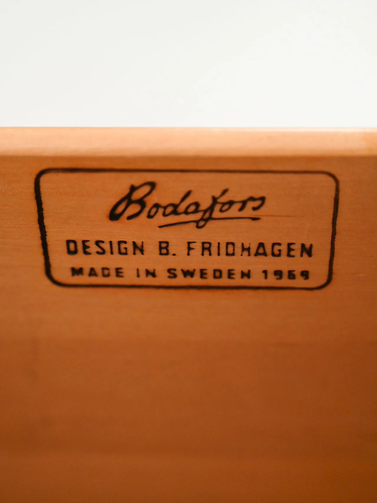 Small Scandinavian chest of drawers with black profiles Bodafors 8