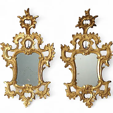 Coppia di specchiere in legno intagliato e dorato, metà '700