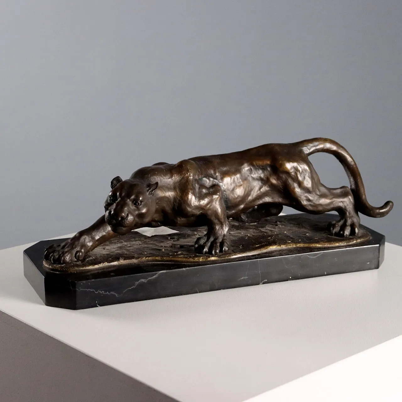 Bronze statue of a lurking tiger on a marble base, 20th century 1
