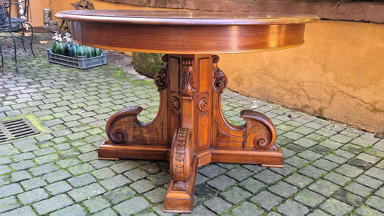 Extendable round walnut table, 19th century 6