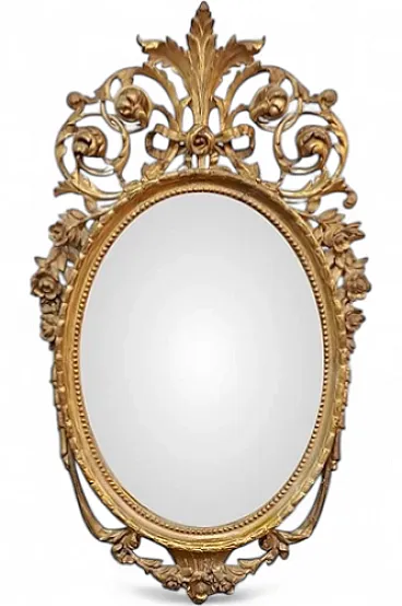 Louis XVI oval mirror in carved and gilded wood, 19th century