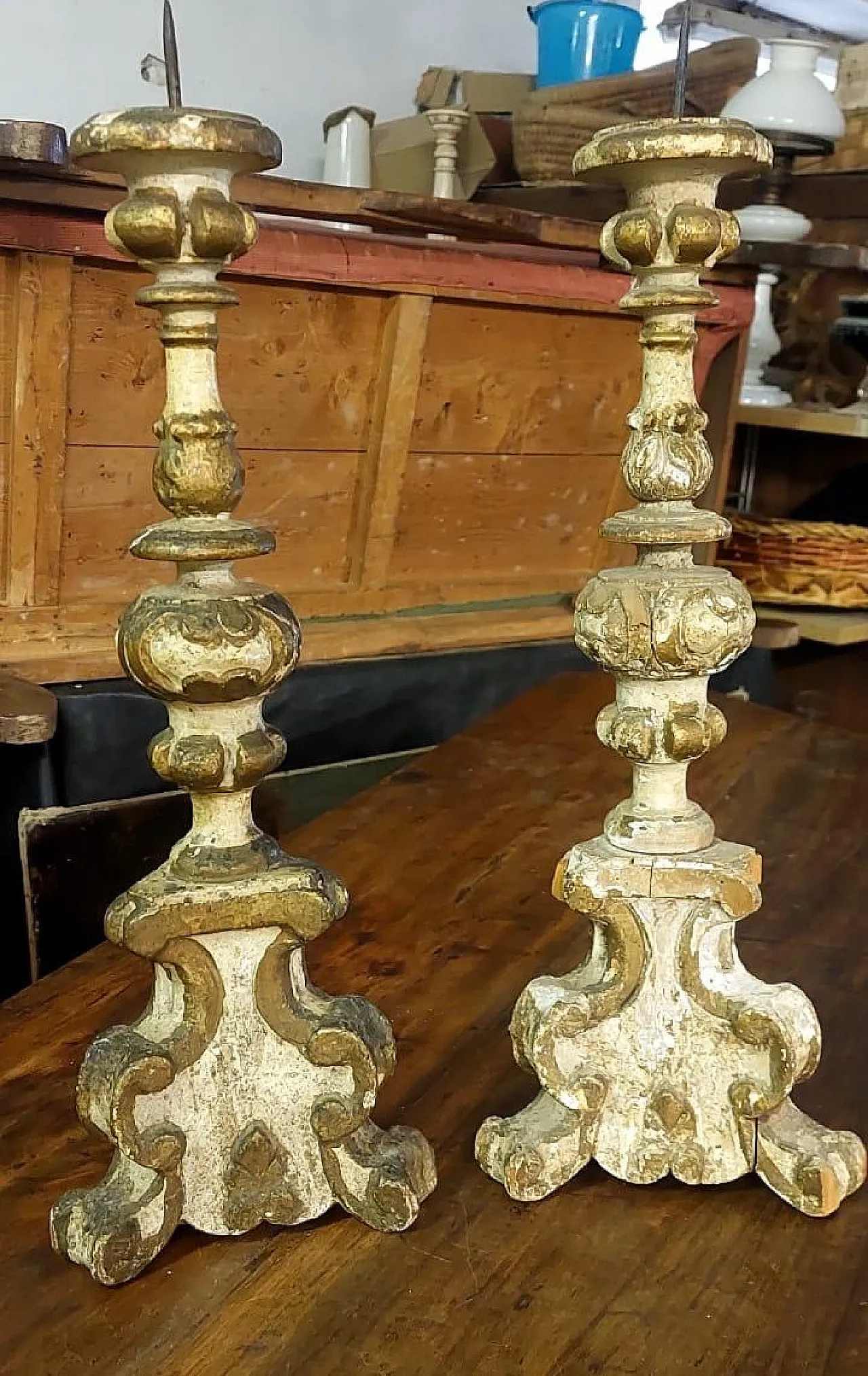 Pair of carved, lacquered and gilded wooden candlesticks, 18th century 1