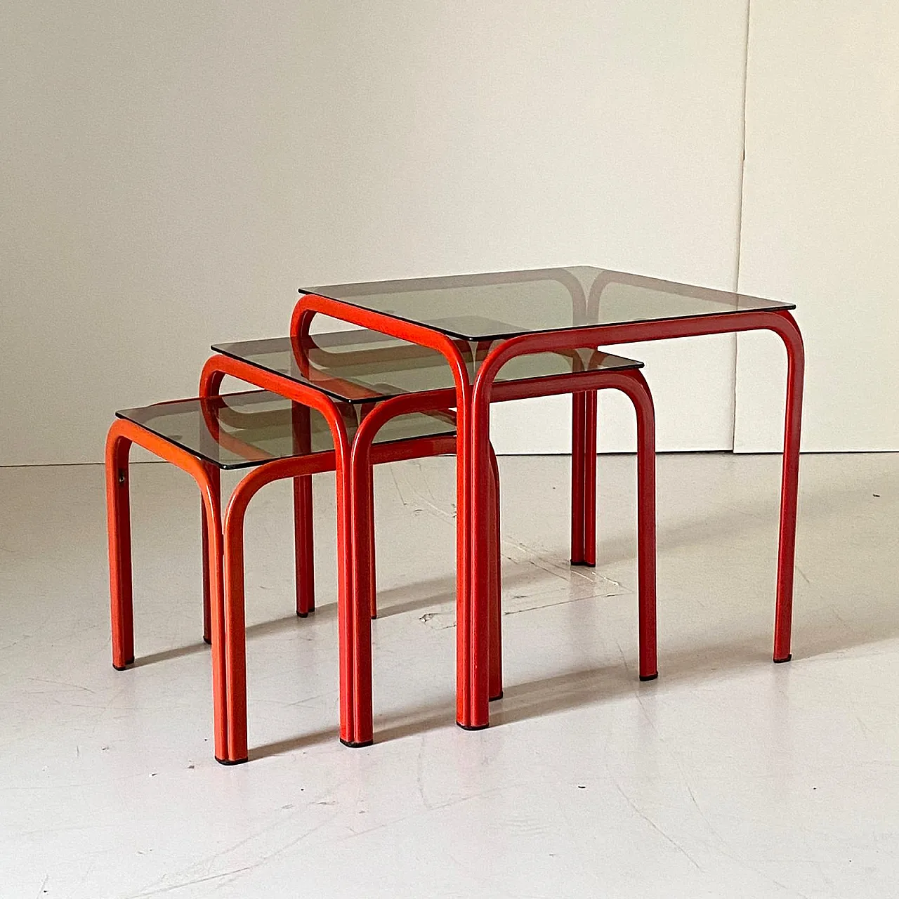 3 red coffee tables with smoked glass, 70s 4