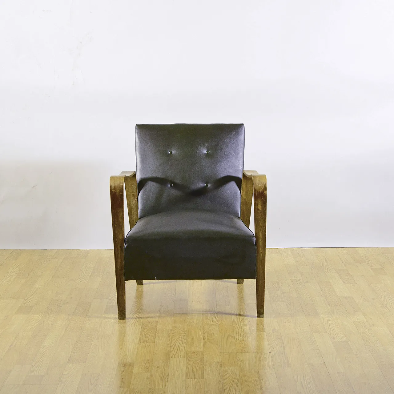 Poltrona verde scuro in pelle e legno di Anonima Castelli, anni '40 6