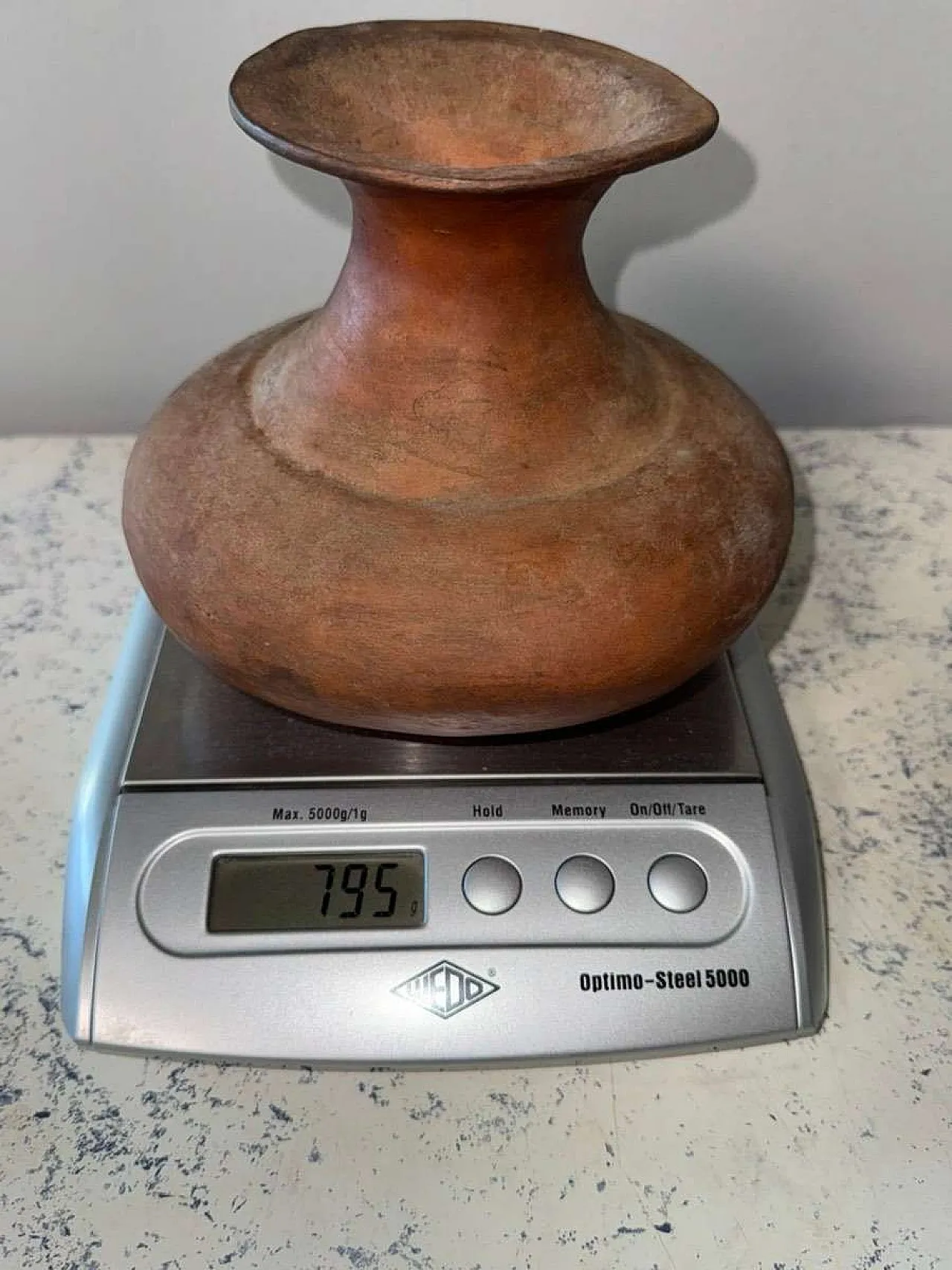 Peruvian globular terracotta vessel with flared rim 7
