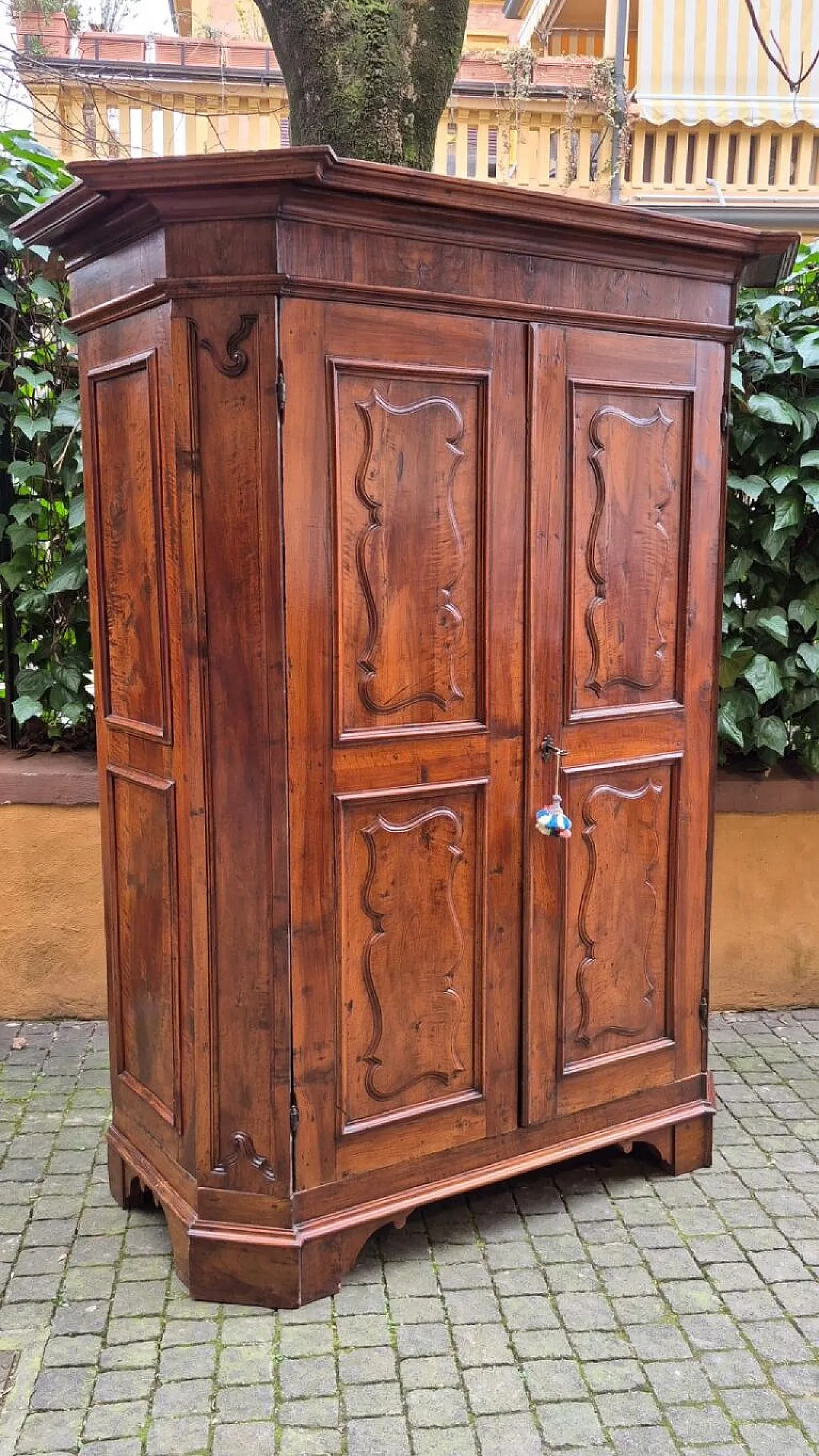 Paneled and rusticated walnut wardrobe, 17th century 5