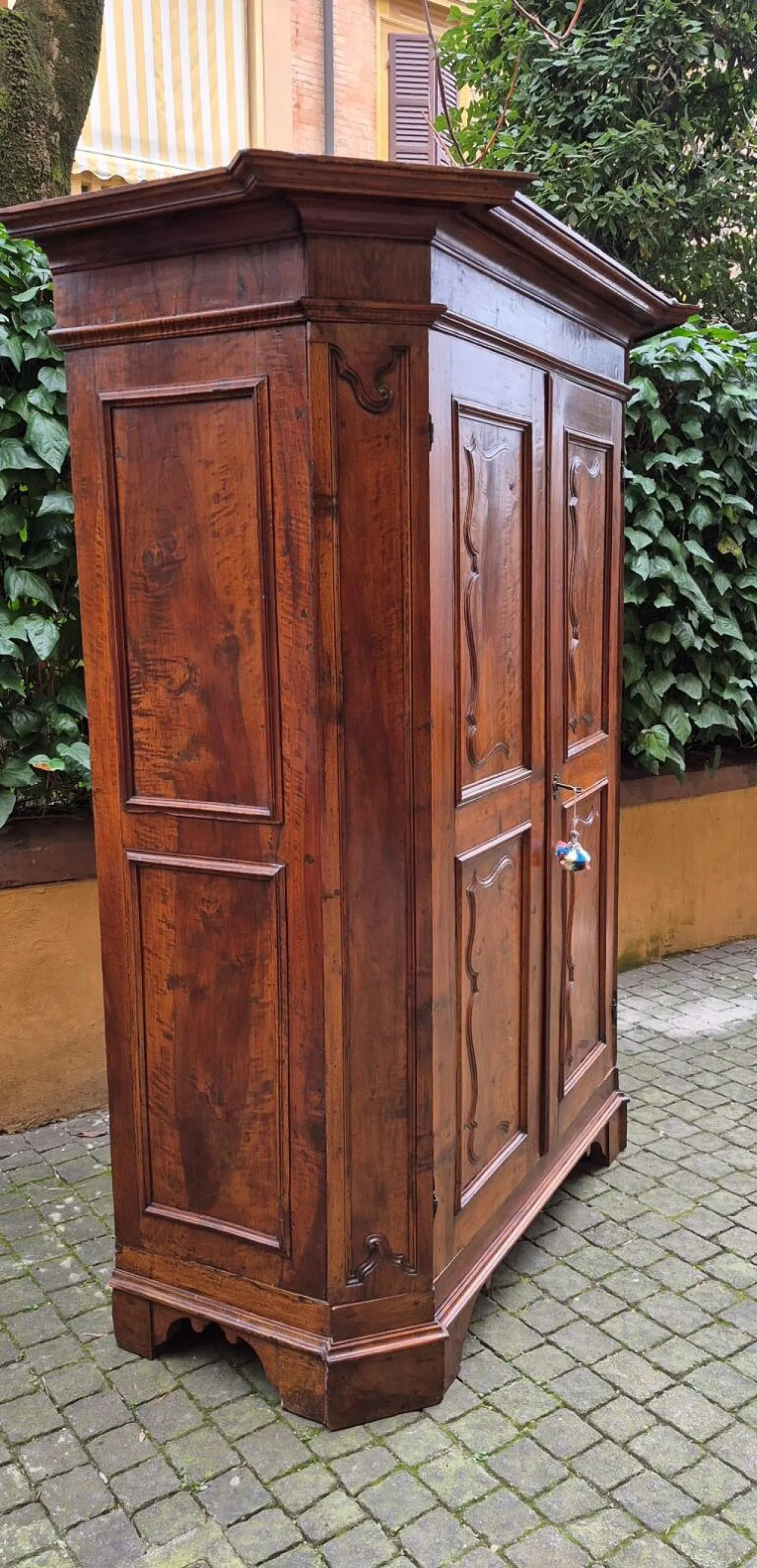 Paneled and rusticated walnut wardrobe, 17th century 6