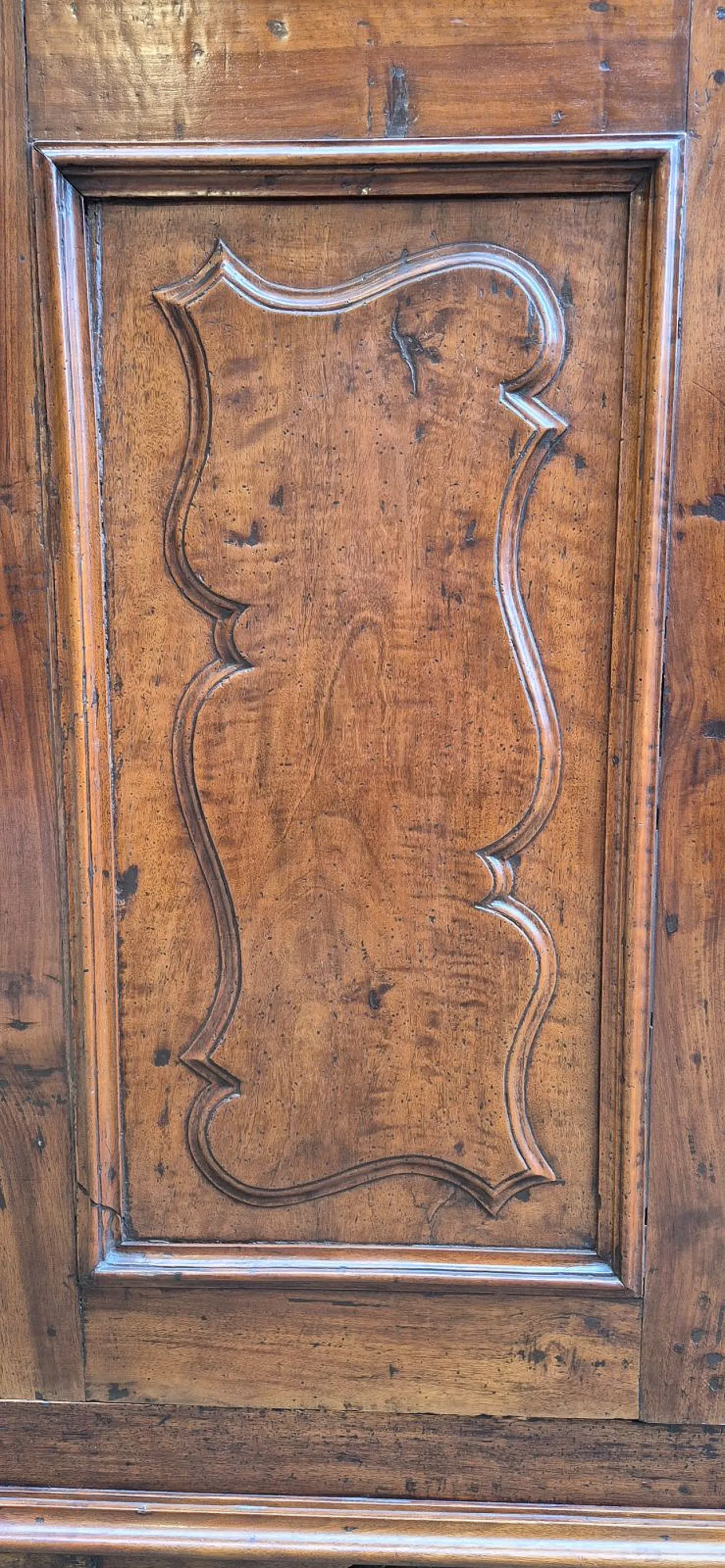Paneled and rusticated walnut wardrobe, 17th century 9