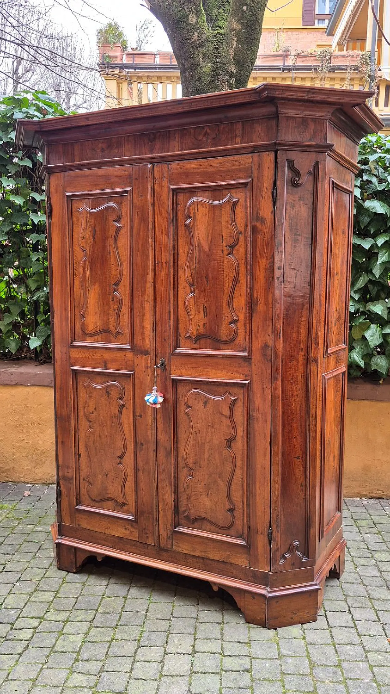 Paneled and rusticated walnut wardrobe, 17th century 10