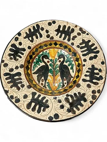 Ceramic plate with polychrome decoration, early 20th century