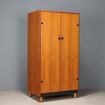 Armadio in impiallacciatura di teak con inserti in legno tinto, '900