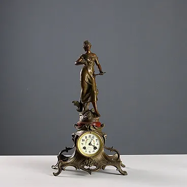 Orologio in antimonio con statua di Auguste Moreau, '900