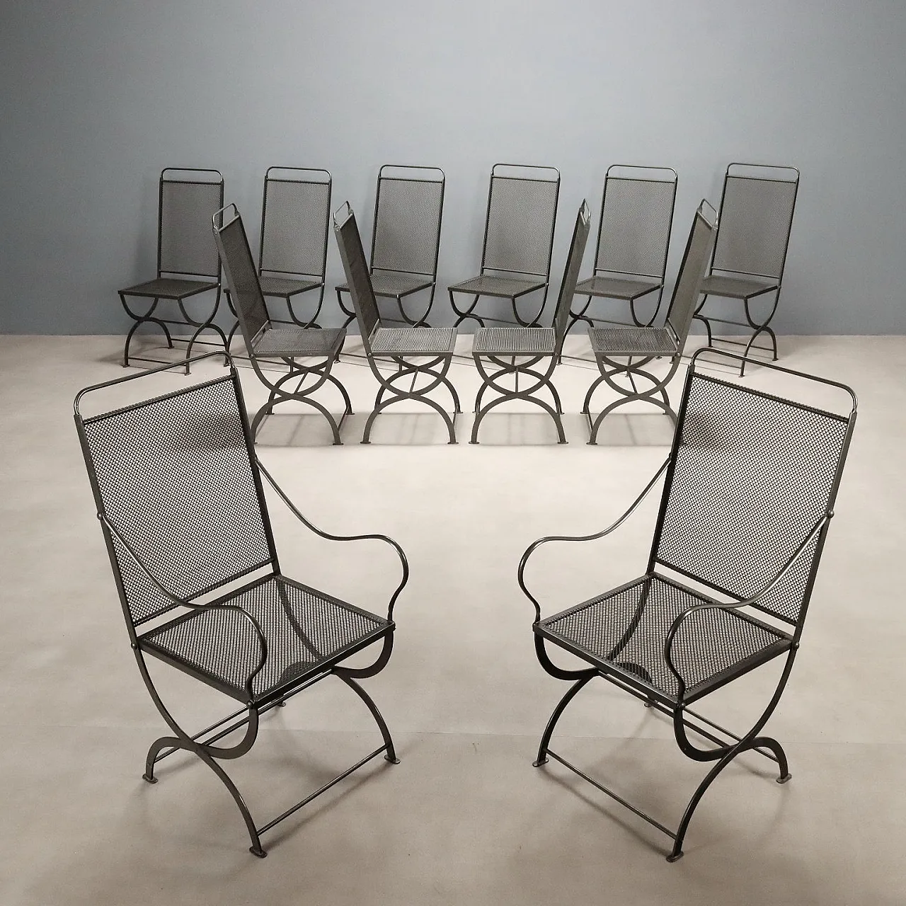 12 Nonaro folding chairs in enameled metal, 1960s 1