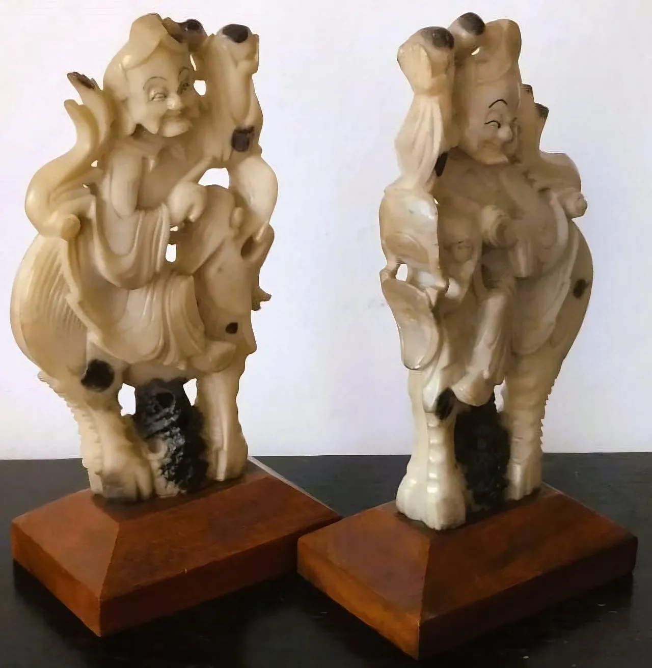 Carved stone sculptures of Qilin knights on wooden bases, early 20th century 3