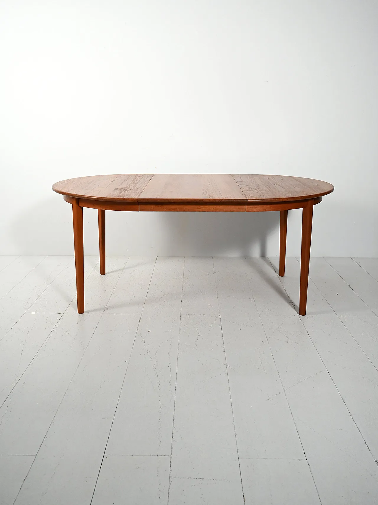 Round extendable teak table by Svante Skogh 1