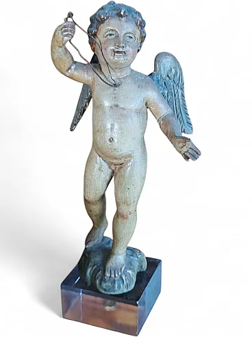 Small polychrome wooden cherub, 18th Century