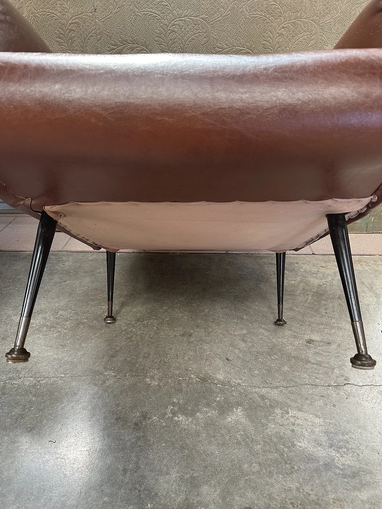 Pair of brown skai armchairs, conical metal feet, Italy, 1950s 11
