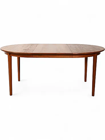 Round extendable teak table by Svante Skogh