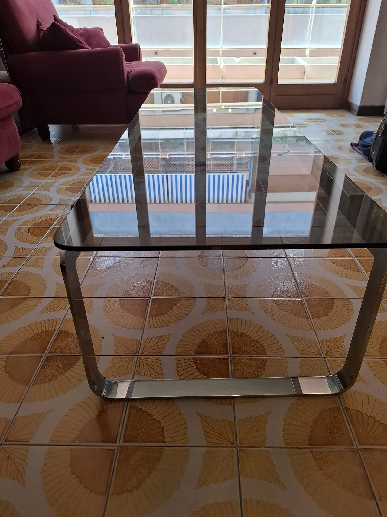 Coffee table in chromed steel and smoked glass 2
