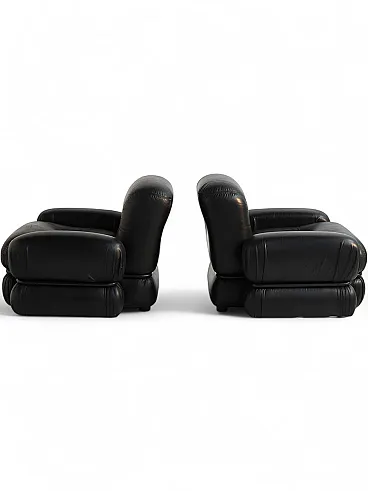 Armchairs in black leather and tubular steel, 70s