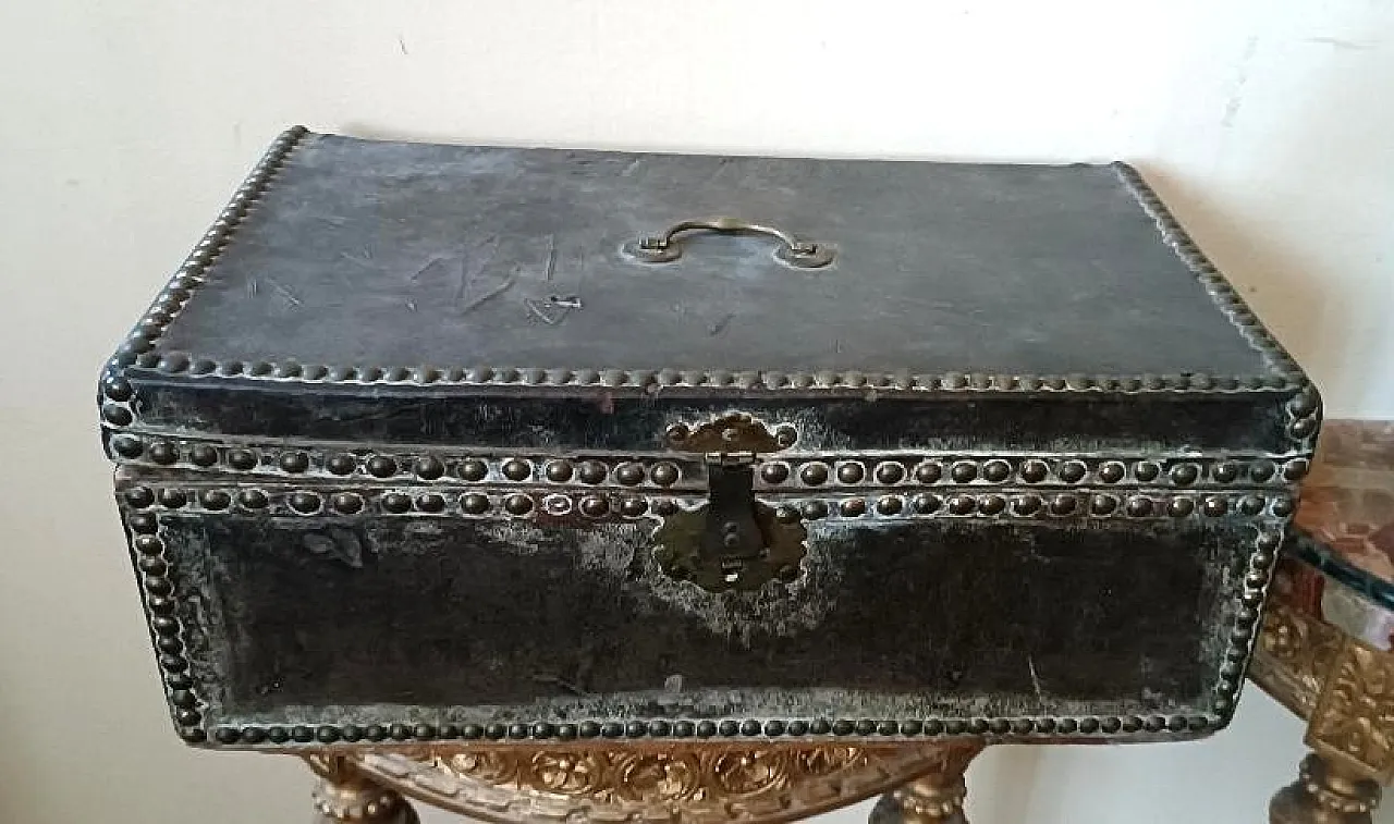 Leather-covered wooden trunk decorated with brass studs, 17th century 1