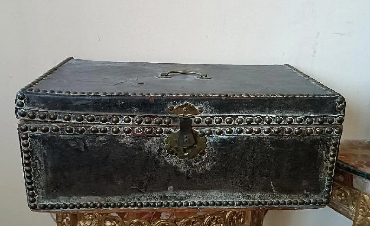 Leather-covered wooden trunk decorated with brass studs, 17th century 2