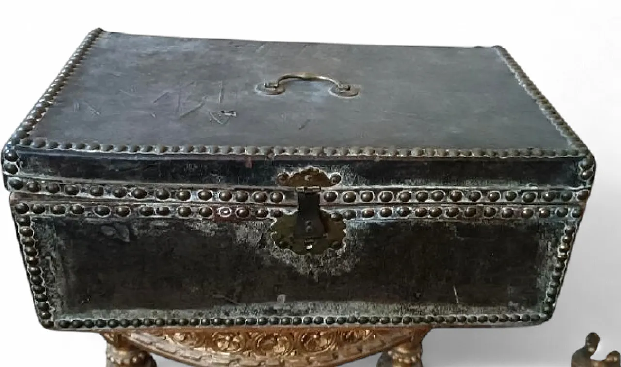 Leather-covered wooden trunk decorated with brass studs, 17th century 13