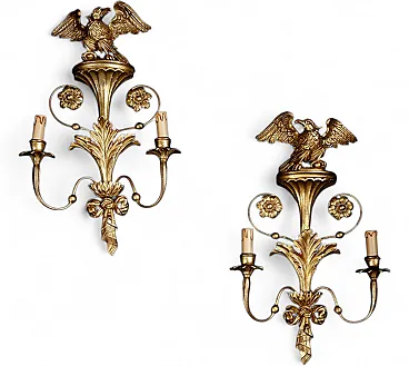 Pair of gilded and carved wooden appliques, 20th century