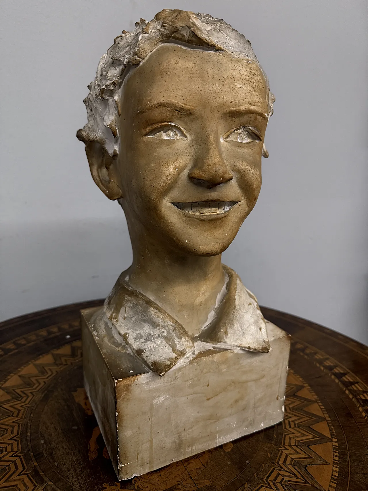 Patinated plaster sculpture of a boy, 1940s 4
