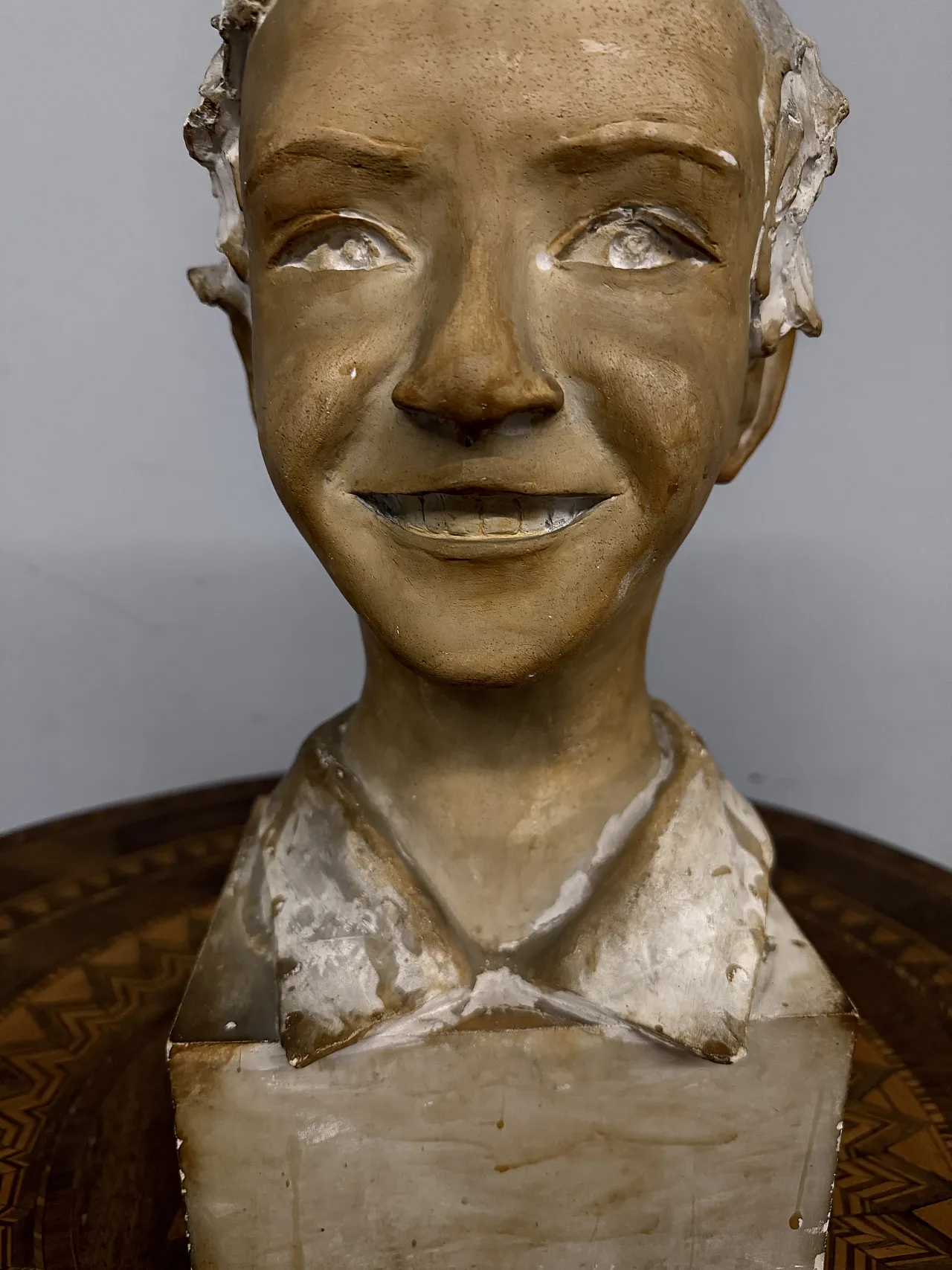 Patinated plaster sculpture of a boy, 1940s 5