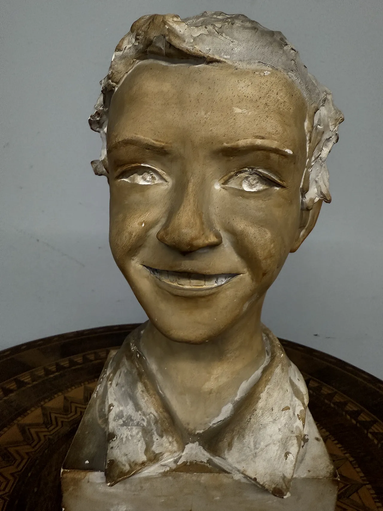 Patinated plaster sculpture of a boy, 1940s 6