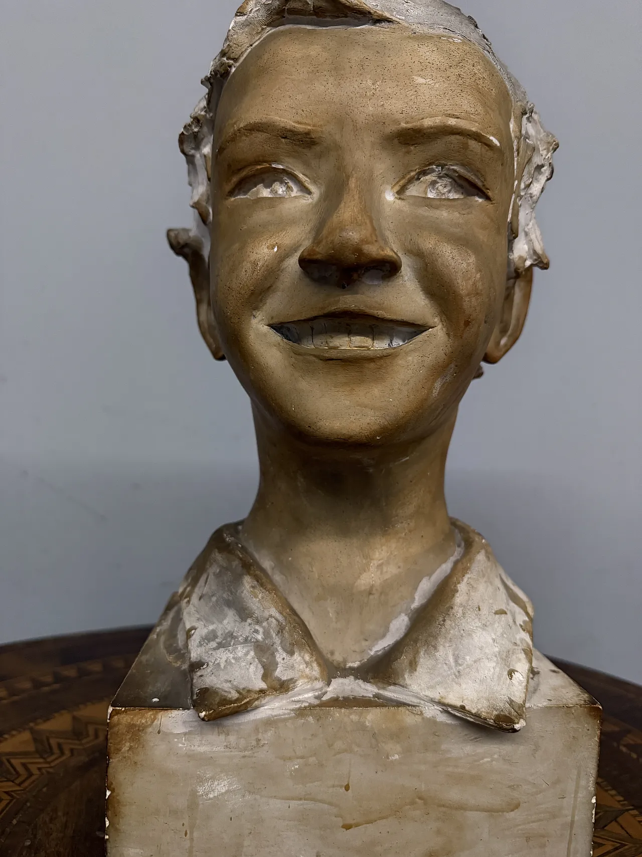 Patinated plaster sculpture of a boy, 1940s 7