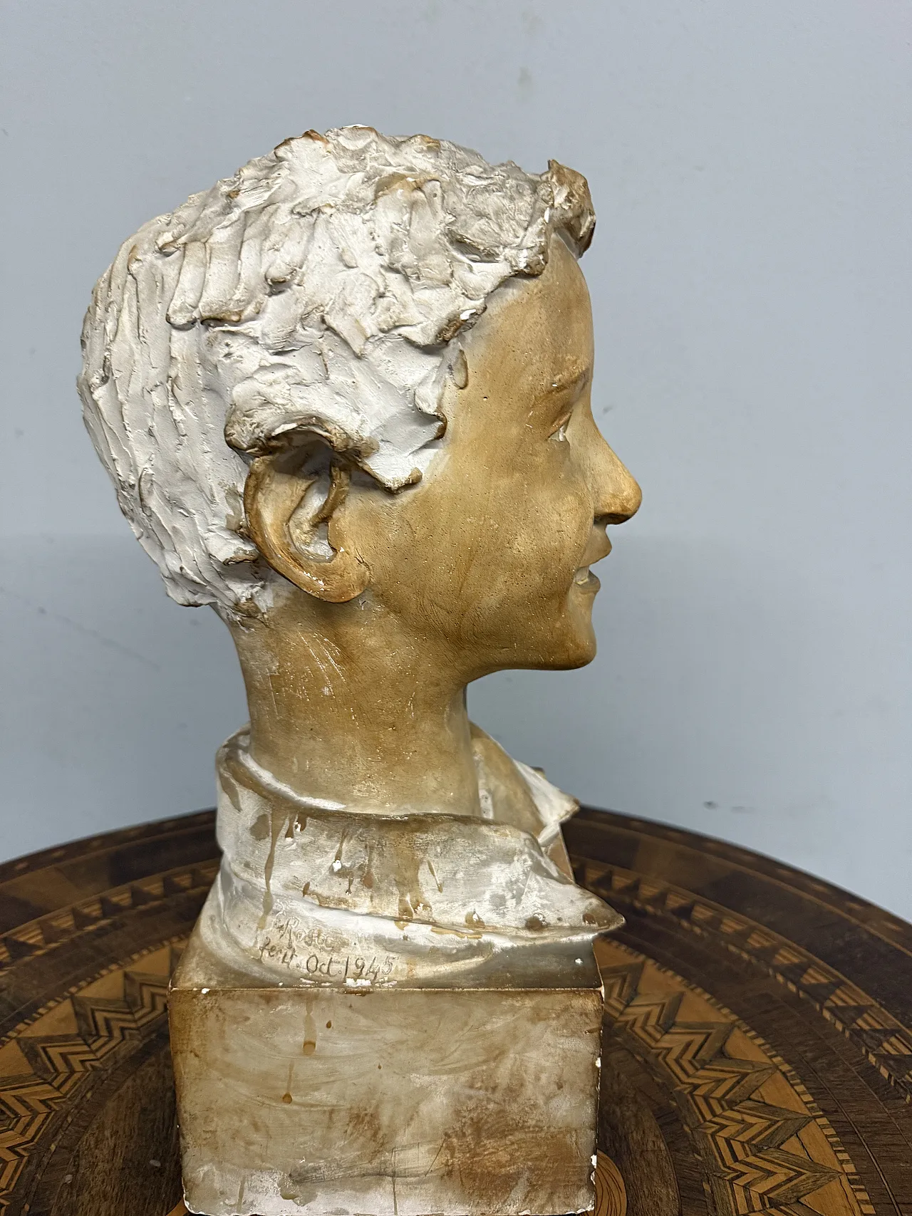Patinated plaster sculpture of a boy, 1940s 11