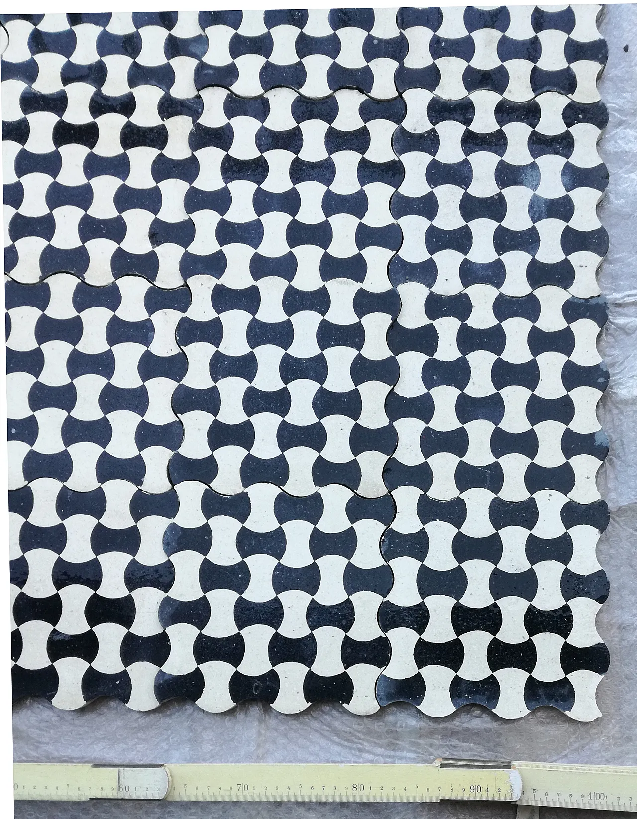 Cement tiles with bow tie pattern, 1920s 5