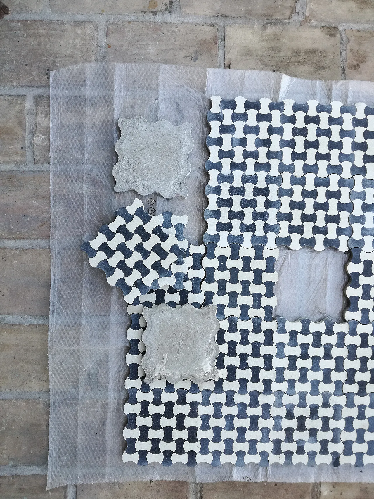 Cement tiles with bow tie pattern, 1920s 9
