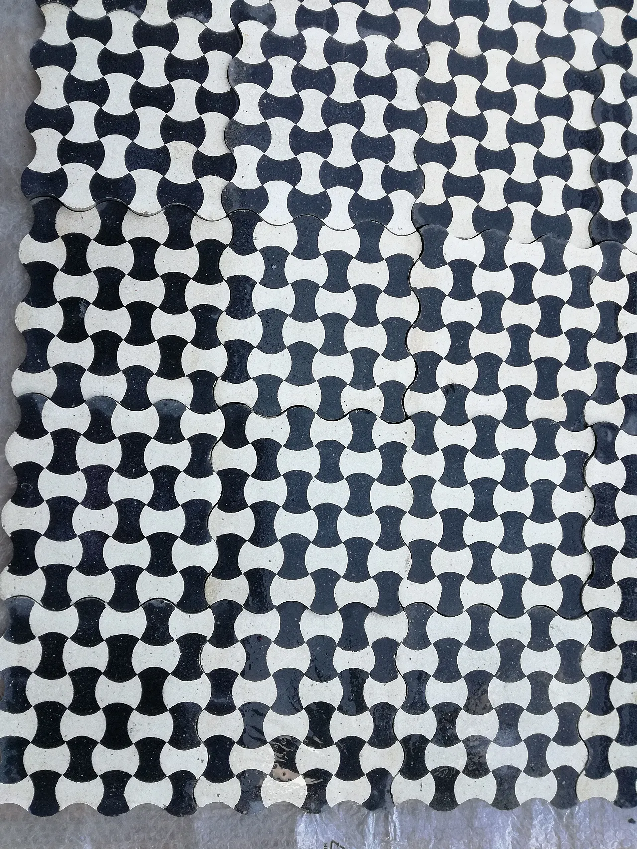 Cement tiles with bow tie pattern, 1920s 12