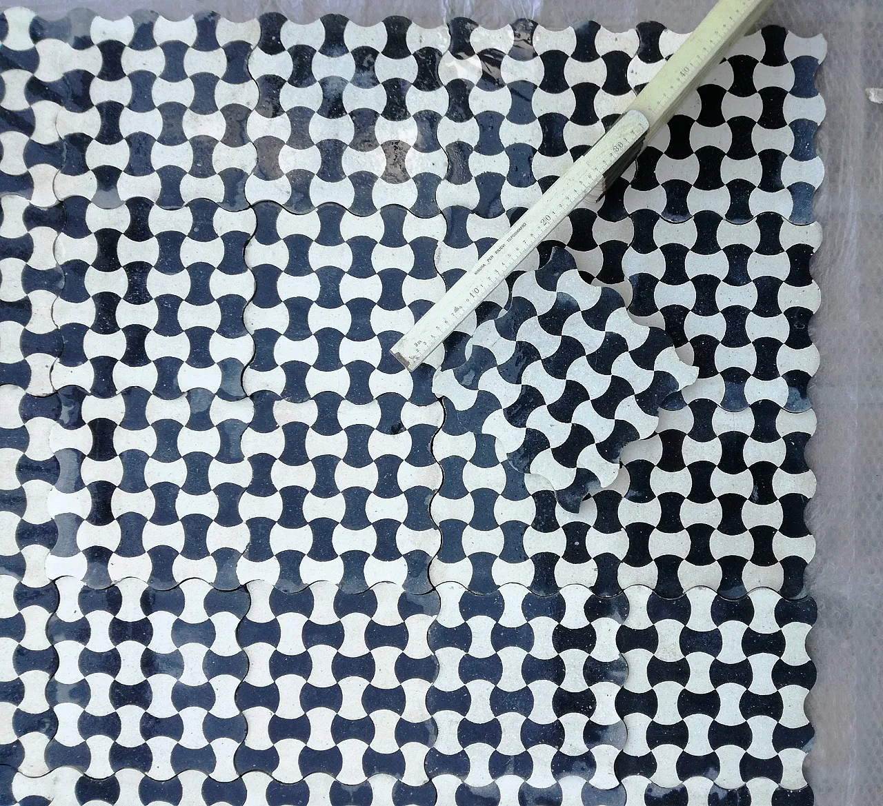 Cement tiles with bow tie pattern, 1920s 14