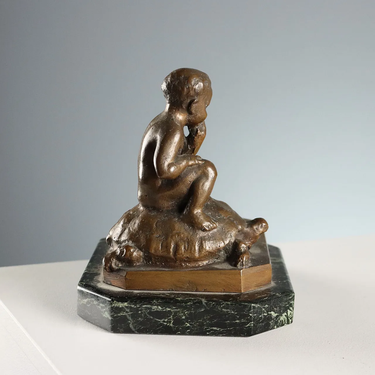 Bronze child and turtle, 20th century 8