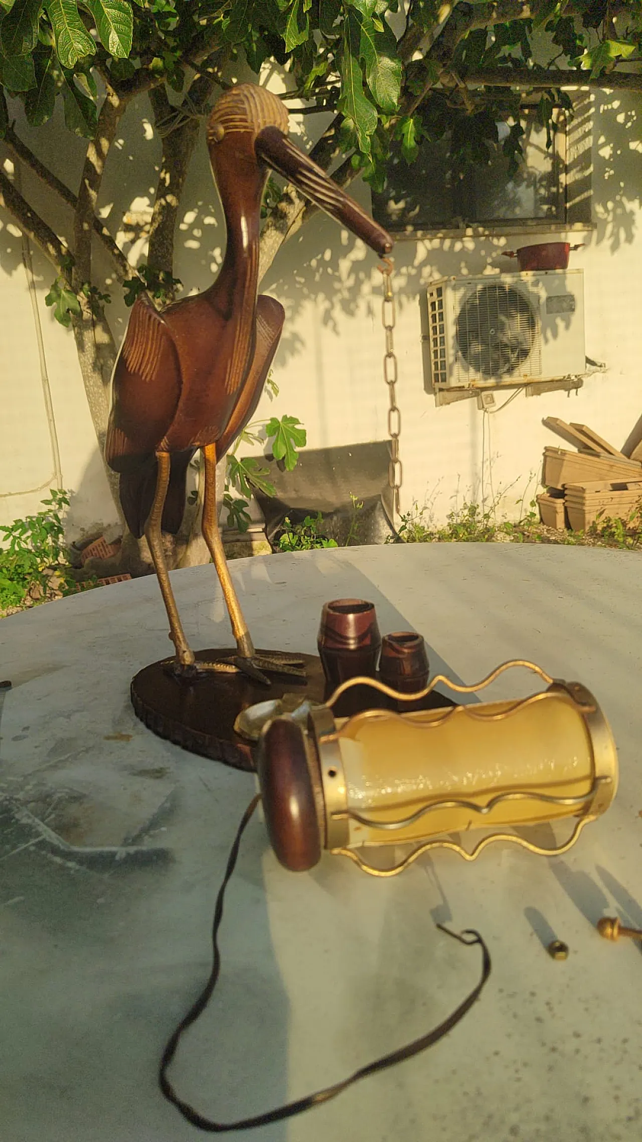 Wooden table lamp with sculpture, 50s 1165800