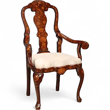 Walnut armchair with threads and floral carvings, 19th century