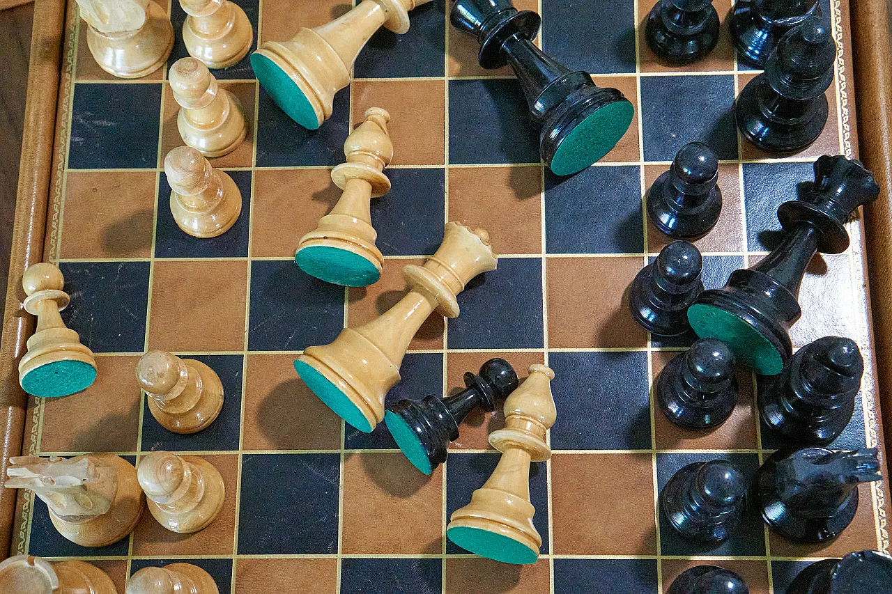 Chessboard with drawer covered in leather, 70s 13