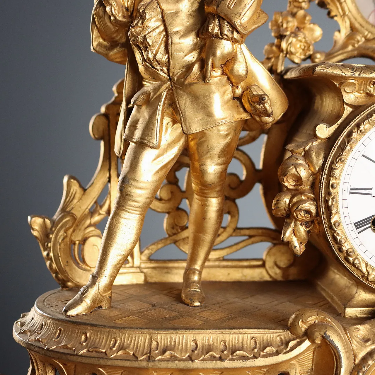 Golden antimony clock on wooden base, 20h century 6