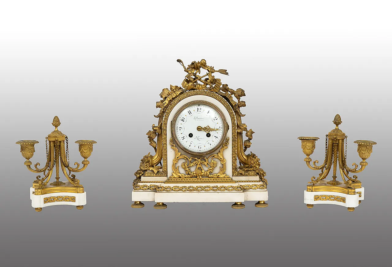 Napoleon III clock triptych in gilt bronze and white marble, 19th c. 1