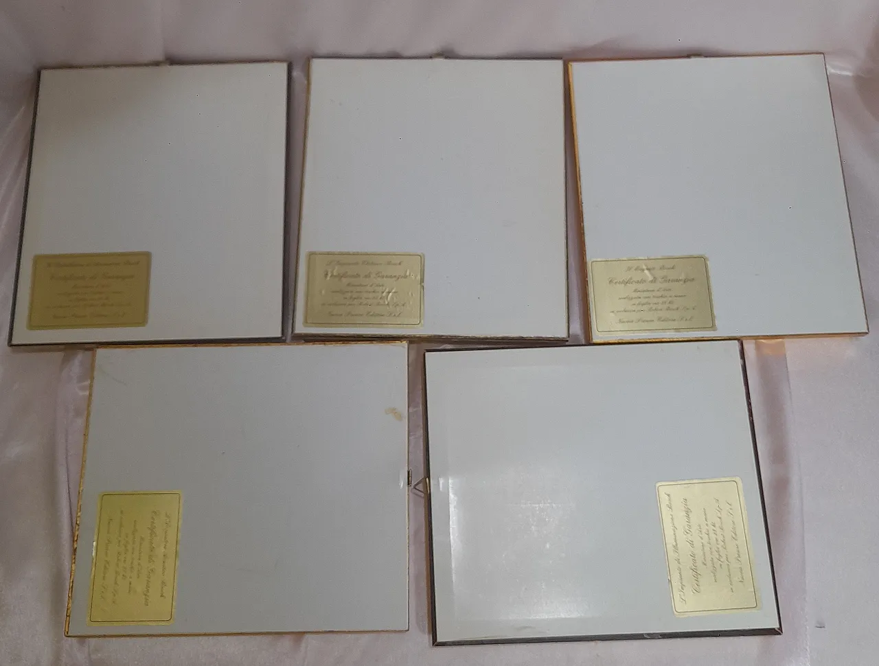 Five small pictures containing artistic miniatures on 23 kt gold leaf, 20
