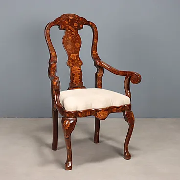Walnut armchair with threads and floral carvings, 19th century