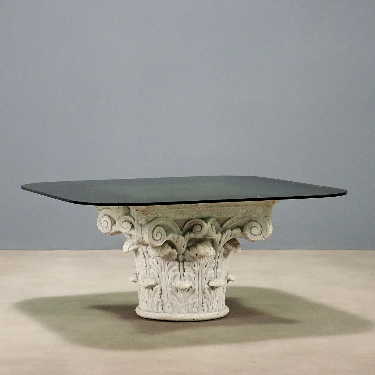 Glass coffee table on capital base, 20th century 1