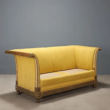 Open-back sofa in carved and gilded wood, late 19th century