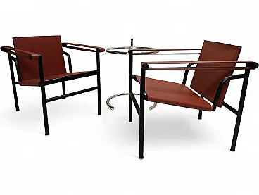 Pair of LC1 armchairs by Alivar in Cognac leather, 2000s