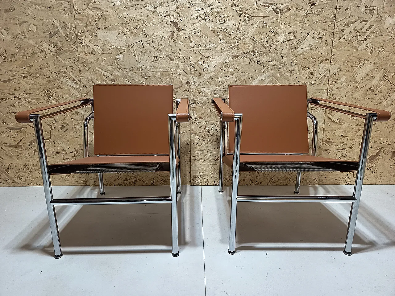 Pair of LC1 armchairs by Alivar in Cognac natural leather, 2000s 6